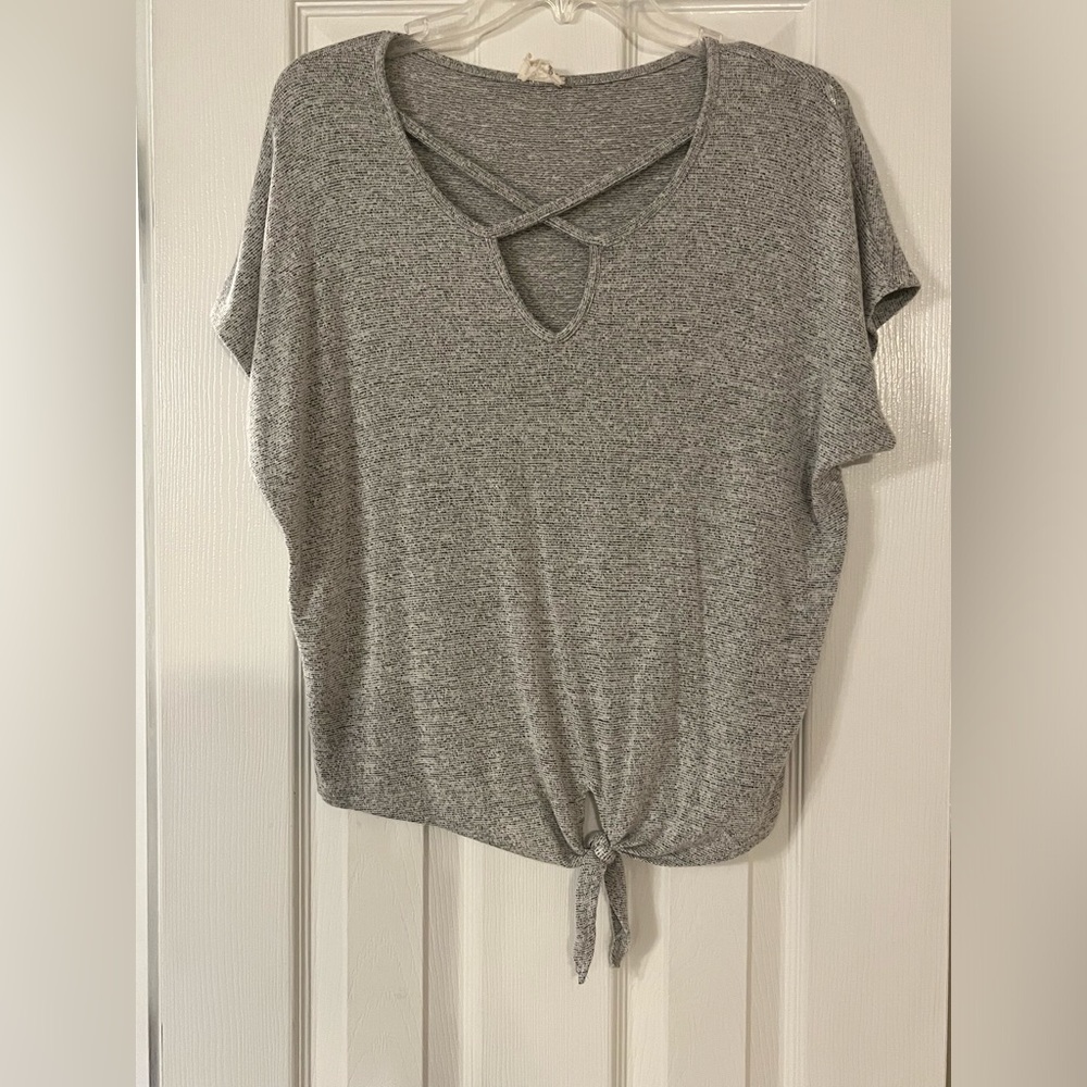 Gray blouse with cute neckline details, also tie up bottom